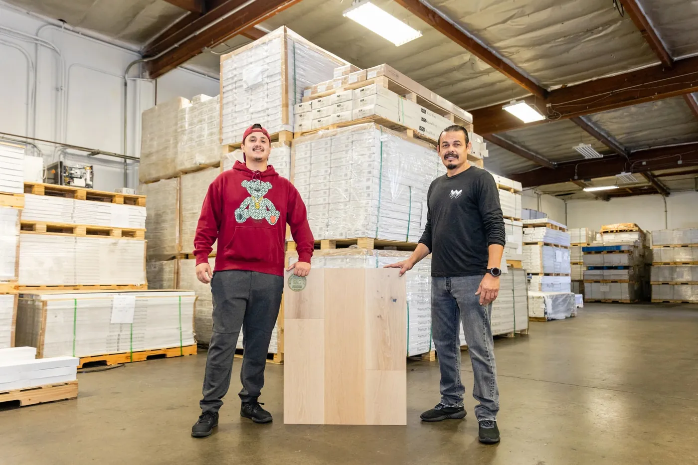Wholesale Woodfloor Warehouse team with flooring inventory in the San Diego warehouse