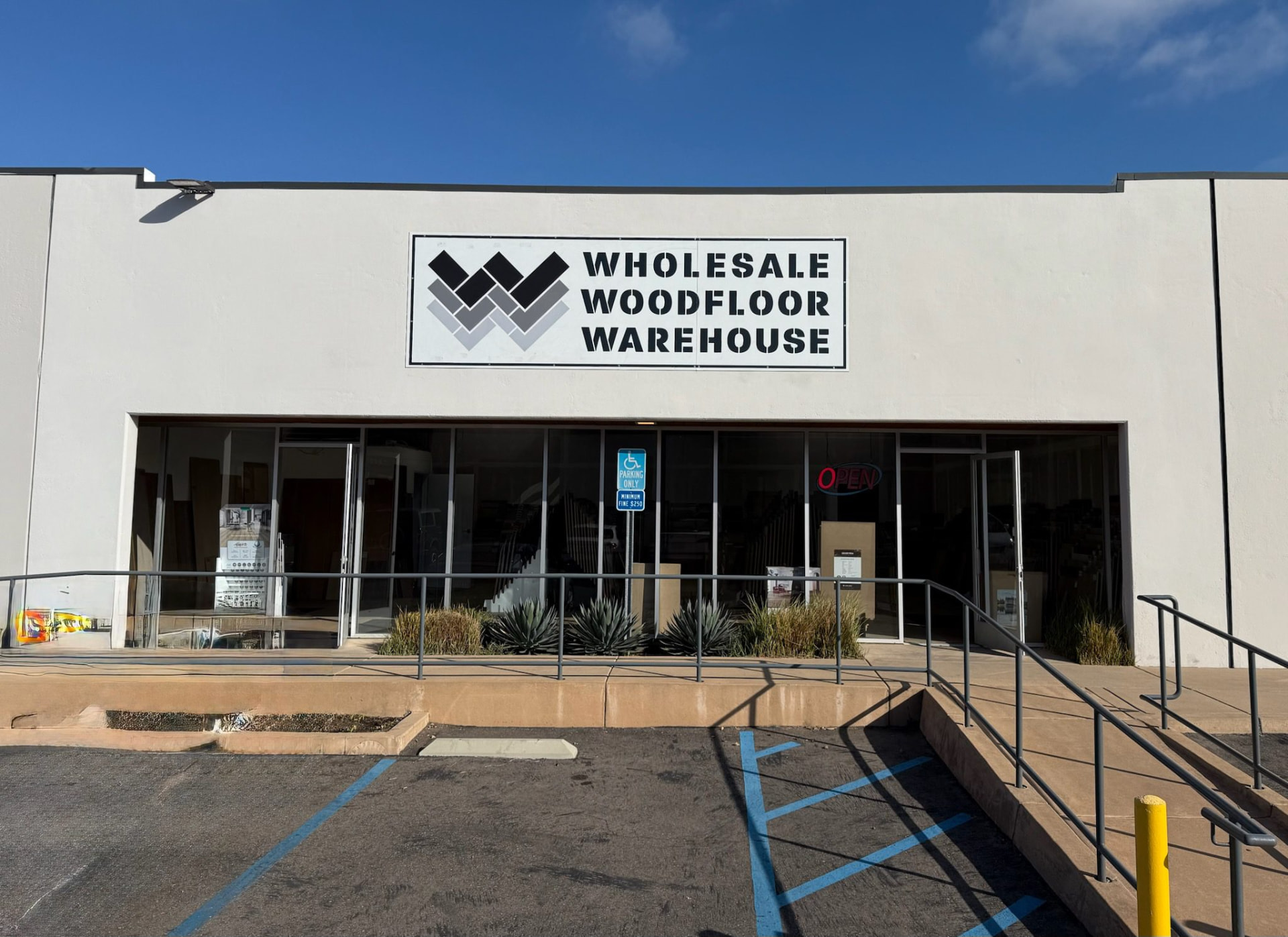Wholesale Woodfloor Warehouse storefront on Miramar Rd in San Diego